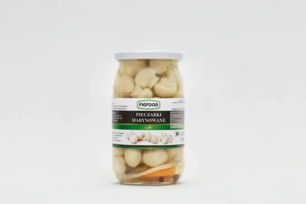 Słoik z pieczarkami marynowanymi Figfood na białym tle.